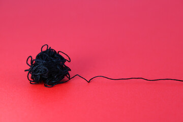 A ball of conflicts finds a way to unravel