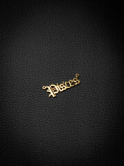 close up gold pendant horoscope with   Pisces   sign on a wooden base  on a black background