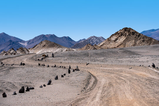 Winding road through the mountainous desert landscape of La Puna