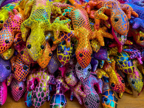 Colorful fabric lizard souvenirs in a Thai market