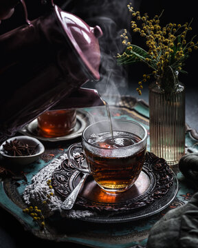 Aromatic anise tea in a cozy setting with steam rising