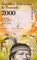 Banknote of 2000 bolivars of Venezuela with the image of Cacique Guaicaipuro, spears, masks. Money...