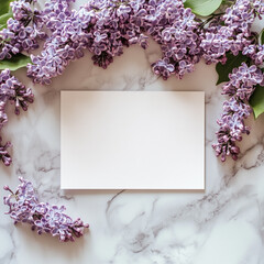 Elegant blank card surrounded by lilac blossoms on marble. ai generated