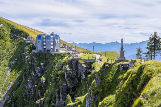 Monte Generoso, Switzerland - July 17. 2021: The popular excursion destination on the 1700 m. high monte Generoso with a modern restaurant and diverse hiking trails in Canton Ticino, Switzerland