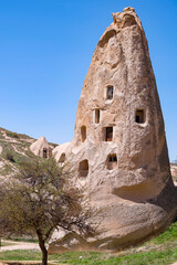 Uchisar Castle or Kalesi, a unique cave building, carved from volcanic rock at the highest point of Cappadocia, Turkiye