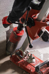 Core Drilling into Concrete Wall During Construction Work