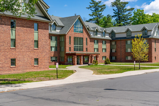 Potsdam, New York, USA - May, 14, 2023 - Exterior photo Moore House residence hall located on the campus of Clarkson University