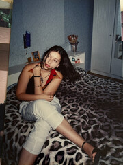 Fototapeta premium Early 2000s Teenage Girl Lifestyle. Authentic Vintage Film Look