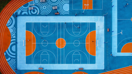 Aerial view of colorful sports court with geometric patterns and vibrant designs, Umag, Croatia.