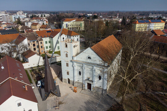 Aerial view of Sisak one year after 6.3-magnitude earthquake showcasing historic buildings, church, and urban landscape, Sisak, Croatia.