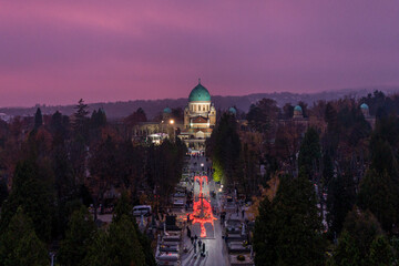 Aerial view of Mirogoj cemetery for All Saints Day with vibrant lights and autumn trees, Zagreb, Croatia.