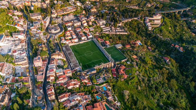 Aerial drone view of football fields in Taormina, Island of Sicily, italy