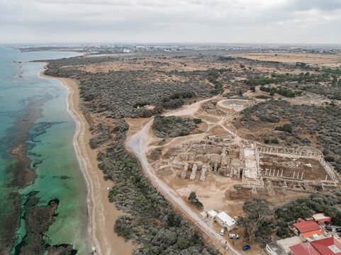 Aerial view of ancient Salamis ruins along the beautiful coastline and blue sea, Agios Sergios, Famagusta, Turkish Republic of Northern Cyprus.