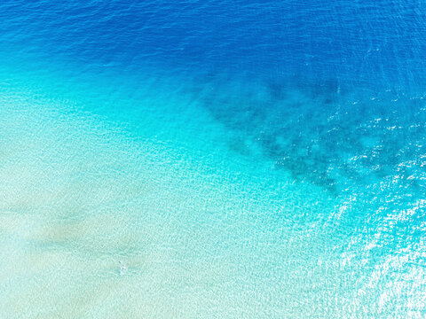 Aerial view of beautiful Jandia sea with clear turquoise water and sandy beach, Pajara, Las Palmas, Spain.
