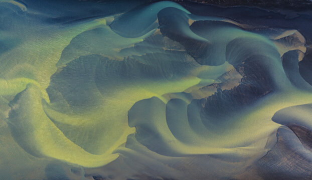 Aerial view of beautiful braided rivers in a scenic landscape, Oraefasveit, Southern Region, Iceland.