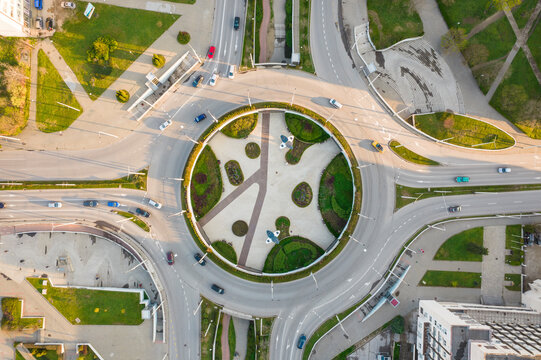 Aerial view of a roundabout with cars and buildings surrounded by greenery, Ruse, Ruse, Bulgaria.