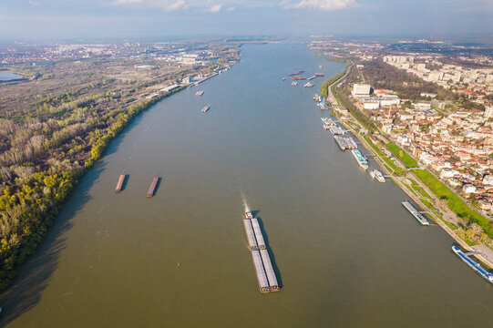 Aerial view of Danube River with cargo ships and cityscape, Ruse, Ruse, Bulgaria.