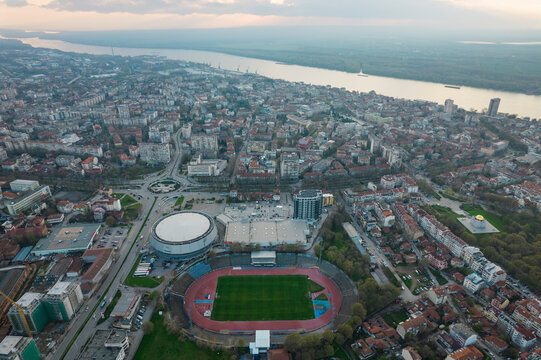 Aerial view of Danube river and football stadium amidst urban landscape, Ruse, Ruse, Bulgaria.