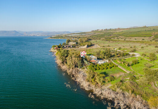 Aerial view of Capernaum Synagogue and the Greek Orthodox monastery along the Jordan River, Sea of Galilee, Israel.