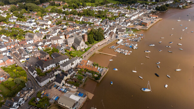 Aerial view of the scenic River Exe with boats and beautiful houses in Topsham, Exeter, England.