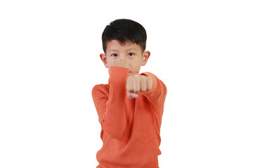 Asian boy child in boxing stance looking straight at camera isolated on white background. Kid...