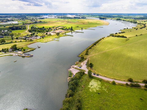 Aerial view of river Nederrijn with crossing ferry between Amerongen and Eck en Wiel, border between provinces of Utrecht and Gelderland, Netherlands.