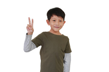 Asian boy kid age 8 years old showing victory sign fingers or fight gesture isolated on white studio background.