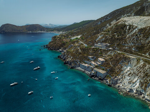 Aerial view of boats along the coast, Lipari island, Aeolian Islands archipelagos, Sicily, Italy.