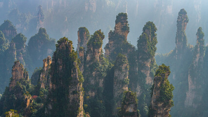 Aerial view of Zhangjiajie National Forest Park at sunset on Avatar mountains, located in Zhangjiajie, Hunan Province, China.
