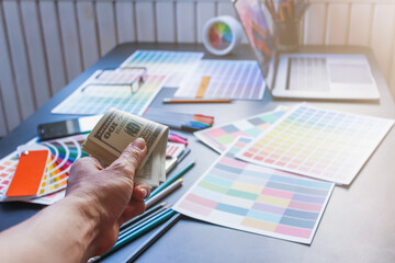 Business start-ups are paying a deposit for designing their programs and products in order to be satisfied and on time.