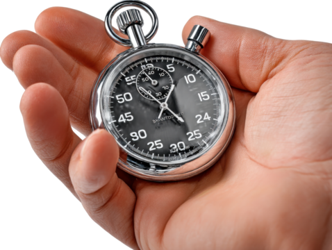 Timing is everything: A detailed view showcases a stopwatch in the embrace of a hand, the chrome surface and the precise face highlighted in this close-up shot.