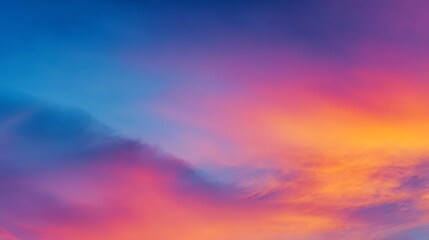 Obraz premium Vibrant blue and orange gradient sky blending smoothly, evoking a sense of serene harmony and boundless energy 