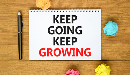 Keep going and growing symbol. Concept words phrase Keep going keep growing on beautiful white...