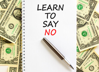 Learn to say no symbol. Concept words phrase Learn to say no on beautiful white note. Dollar bills....