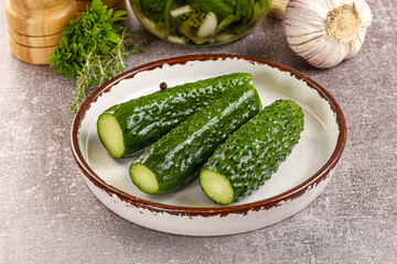 Homemade lighty salted cucumbers with herbs