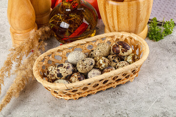 Raw quail egg in the bowl