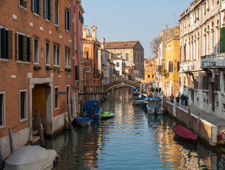 Canal in Venice with bridge, Italy