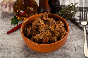 Shredded slow cooked pork meat