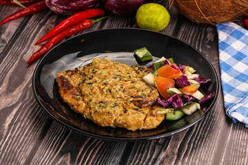 Tasty chicken steak with vegetables