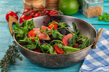 Salad with salmon and arugula