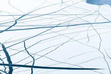 cracks in the ice of the reservoir