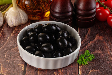 Mediterranean marinated Black olives in the bowl