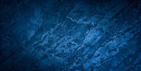 Dark blue stone grunge background with copy space for design