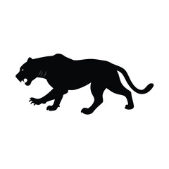 Silhouette of a crouched tiger in hunting pose.