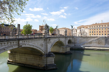 Naklejka premium Beautiful view of the historic Sant'Angelo Bridge over the Tiber River in Rome, Italy with clear blue sky