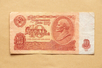 Soviet banknote 10 rubles 1961 with a portrait of Lenin on a background of craft paper, Soviet...
