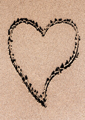 Love heart pattern on the sand