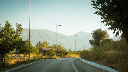 Driving around Lasithi Plateau. Empty mountain road in the afternoon - driver's point of view....