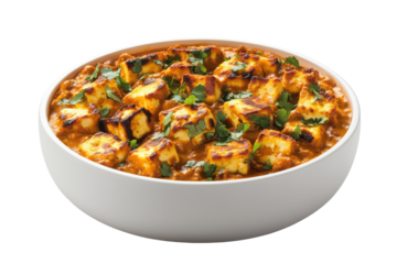 Paneer delight a rich curry with grilled cheese cubes sprinkled with fresh herbs in a white bowl