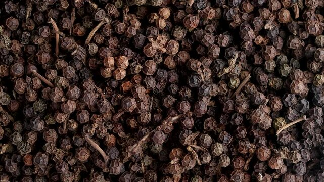Top view rotating of dry herbal Organic Black Pepper